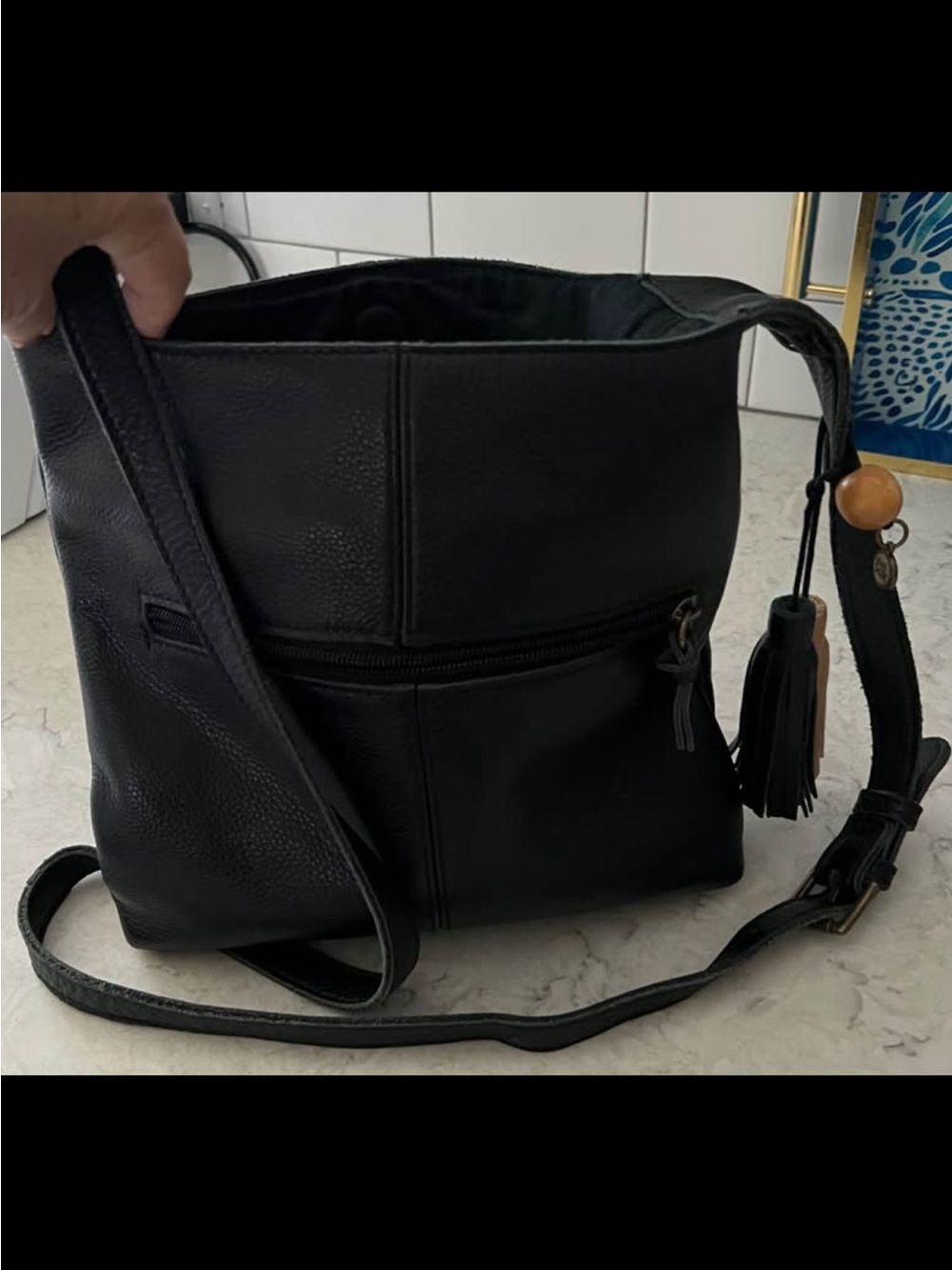 Saxx Black Crossbody Bag with Tassel and Wood Bead Accent